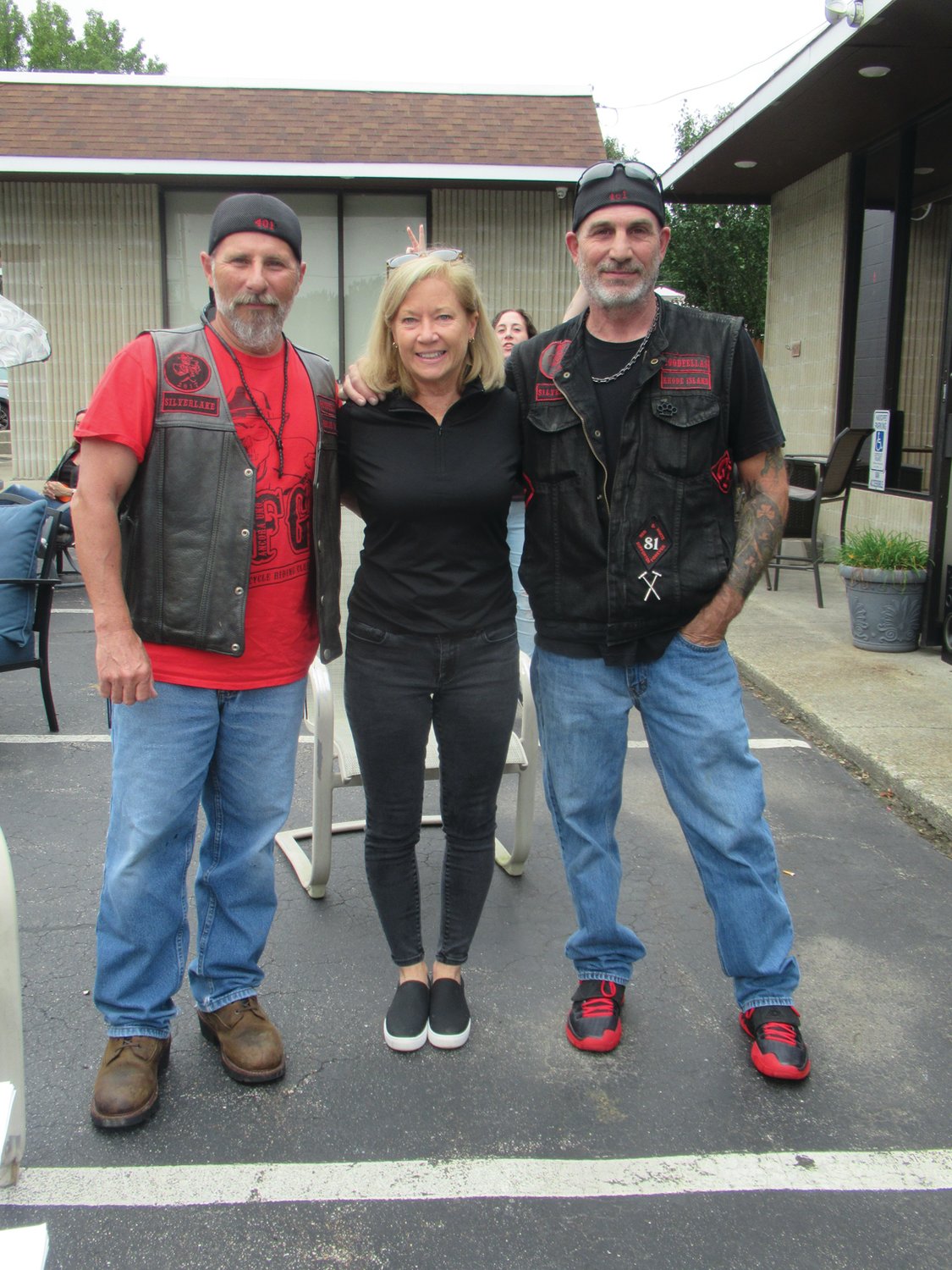 HASBRO HELPERS: Goodfellas Rick DeLuca and Kevin Heart join Michele Brannigan prior to the start of Saturday’s 5th annual motorcycle run that took in an estimated $20,000, an amount that’s expected to reach $40,000.